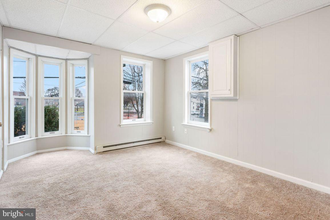 128 High Street Hanover, PA 17331 - Photo 12 of 36 an empty room with windows