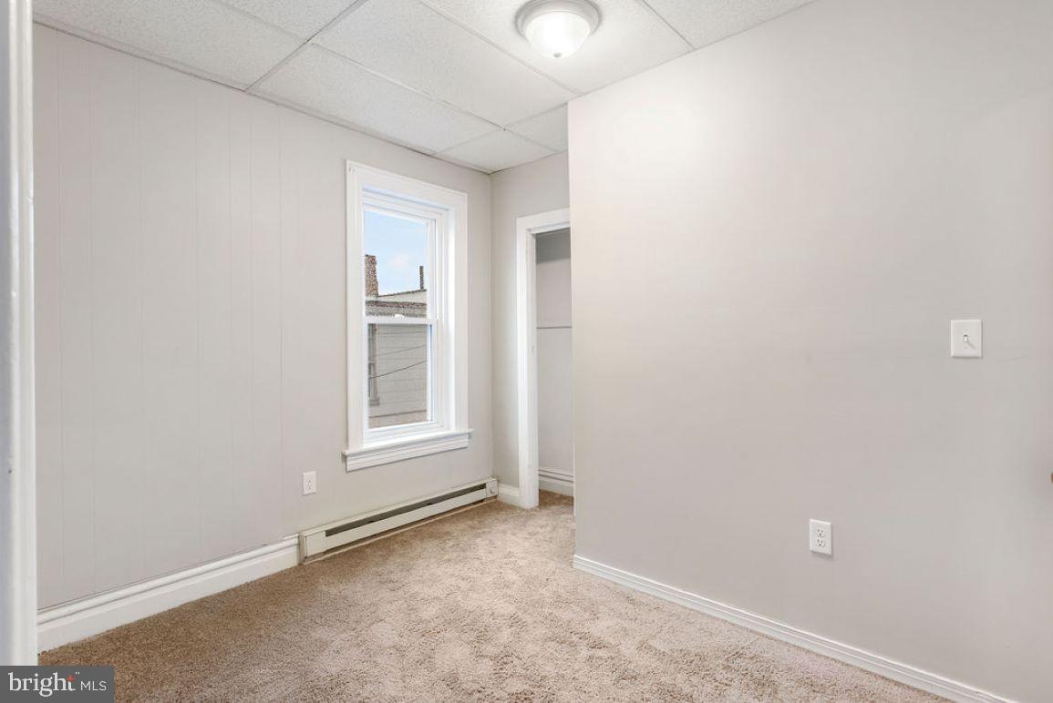 128 High Street Hanover, PA 17331 - Photo 14 of 36 a view of an empty room with a window