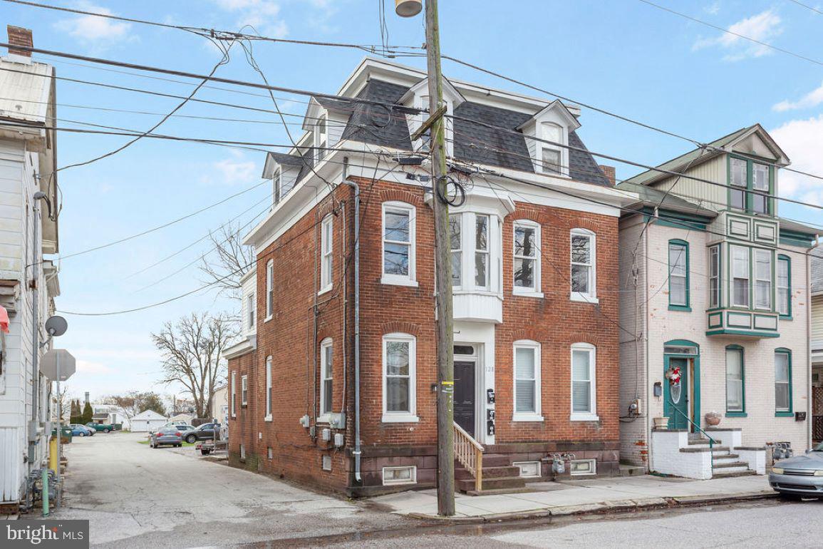 128 High Street Hanover, PA 17331 - Photo 2 of 36 a front view of a building with street