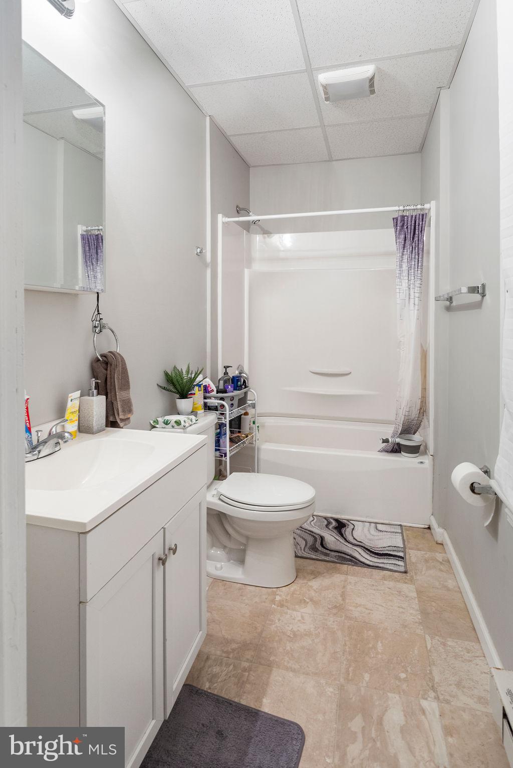 128 High Street Hanover, PA 17331 - Photo 22 of 36 a bathroom with a sink toilet and shower