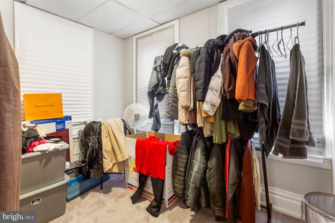 128 High Street Hanover, PA 17331 - Photo 25 of 36 a view of walk in closet with clothes and shoes