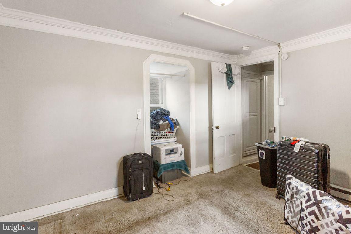 128 High Street Hanover, PA 17331 - Photo 27 of 36 a view of a livingroom with furniture and closet