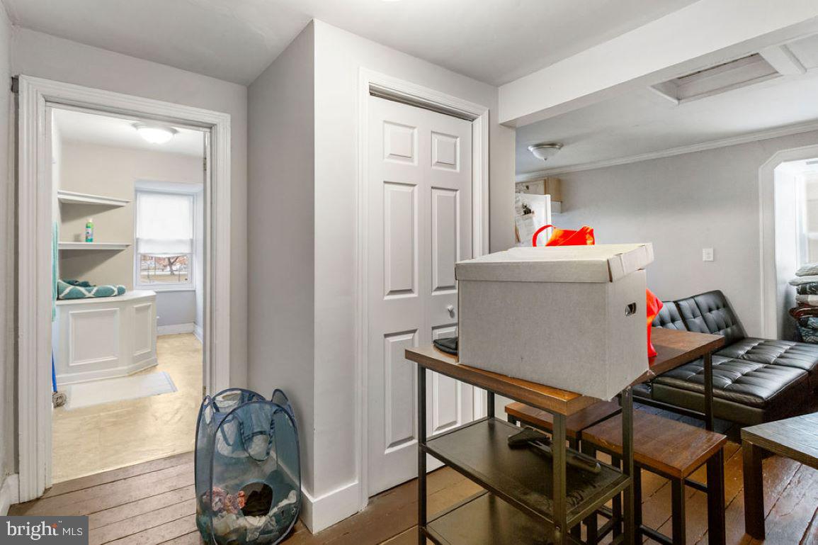 128 High Street Hanover, PA 17331 - Photo 28 of 36 a room with furniture and a gate