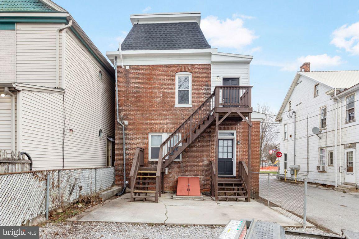 128 High Street Hanover, PA 17331 - Photo 35 of 36 a front view of a house with a garage
