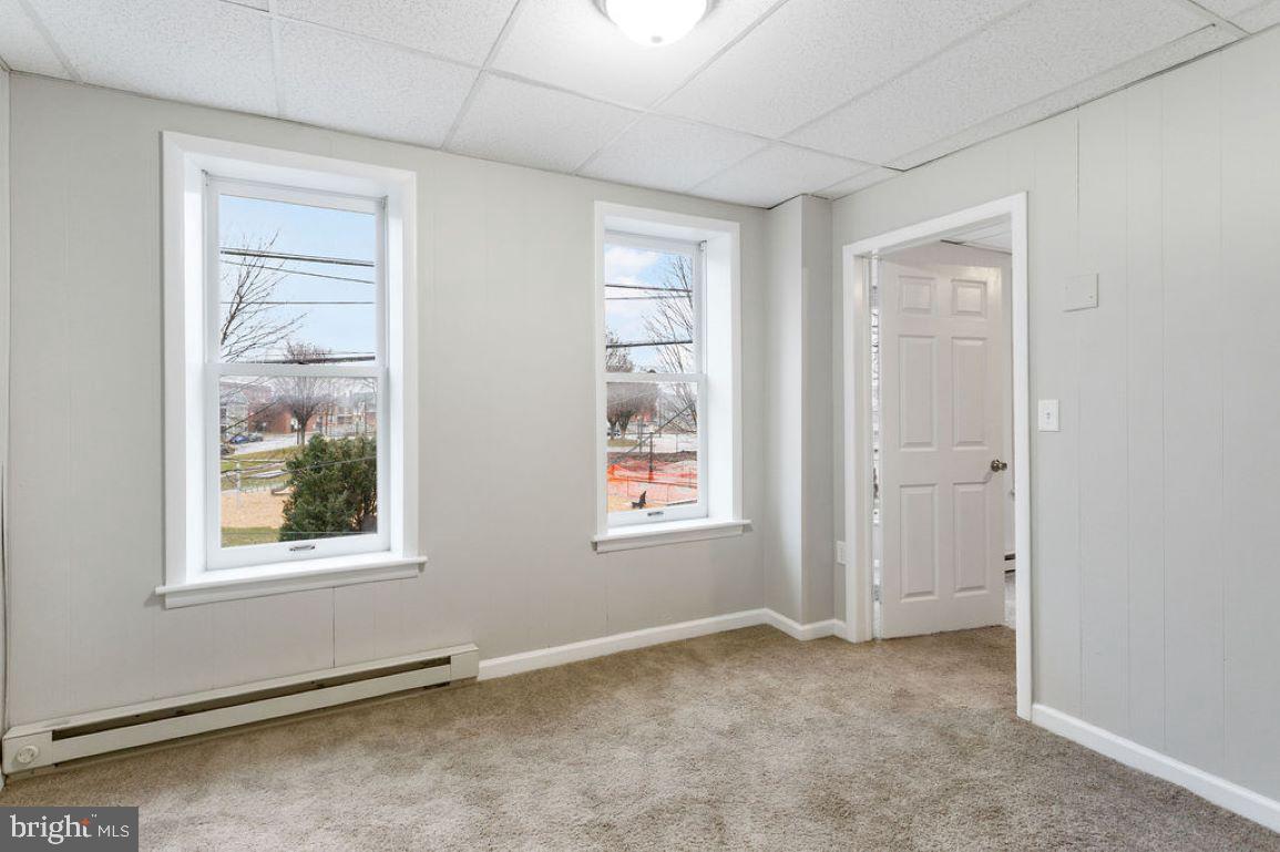 128 High Street Hanover, PA 17331 - Photo 8 of 36 an empty room that has a window