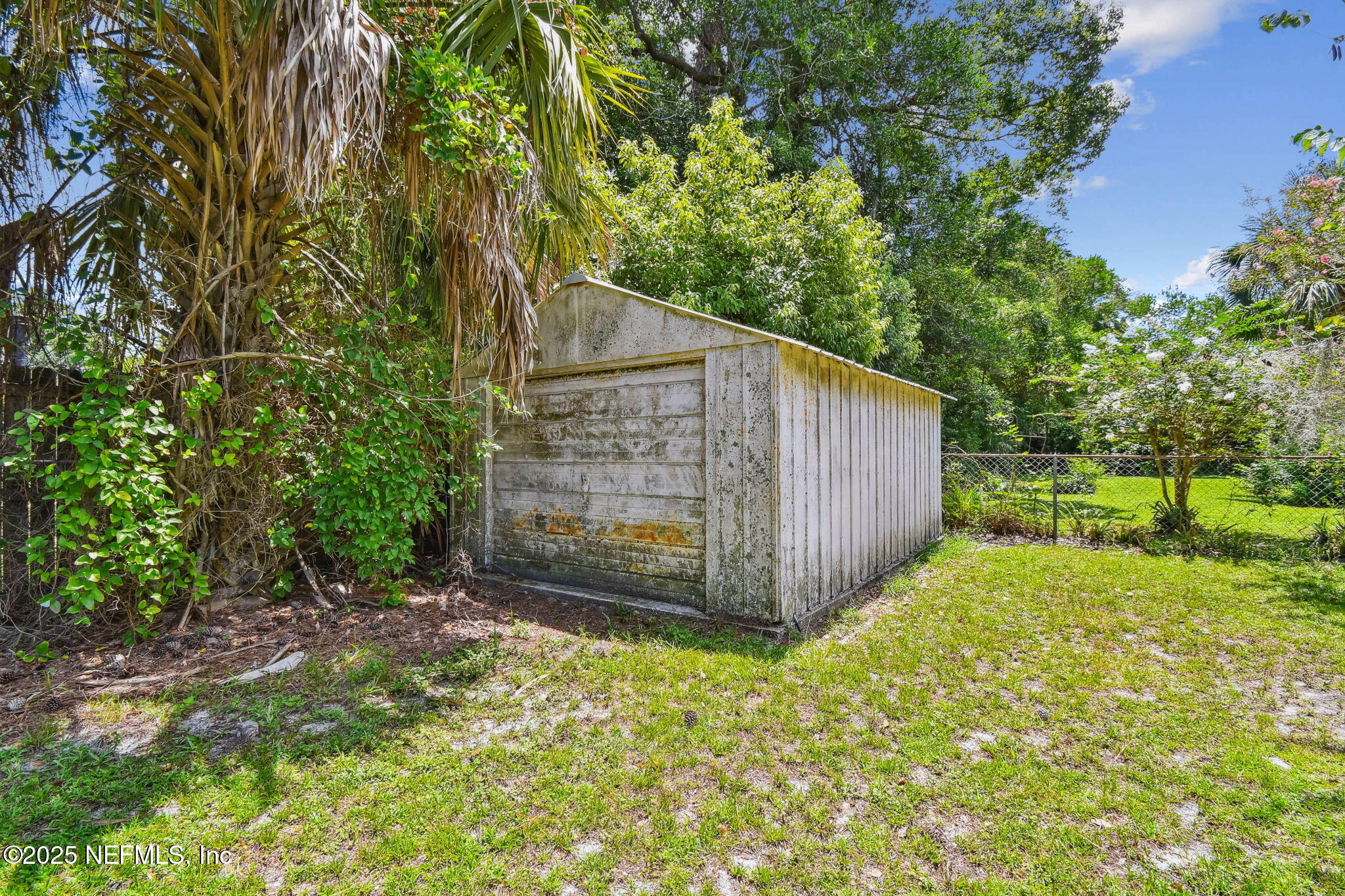 623 Mandalay Road Jacksonville, FL 32216 - Photo 33 of 36 a view of backyard with green space
