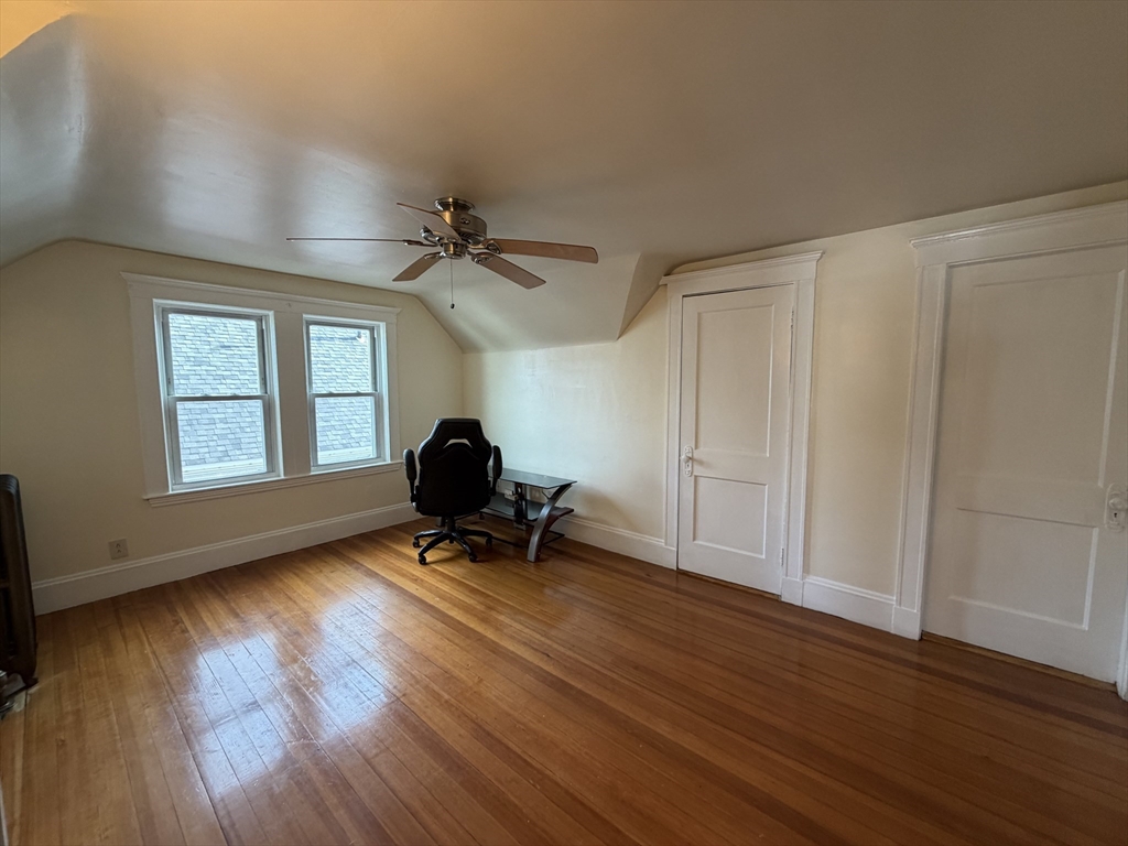 46 Walker Street, Unit 2 Somerville, MA 02144 - Photo 14 of 18 a view of workspace with wooden floor and windows