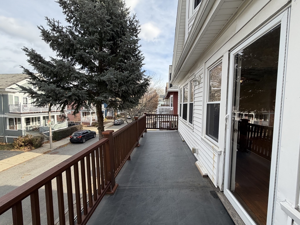 46 Walker Street, Unit 2 Somerville, MA 02144 - Photo 18 of 18 a view of a street from a balcony
