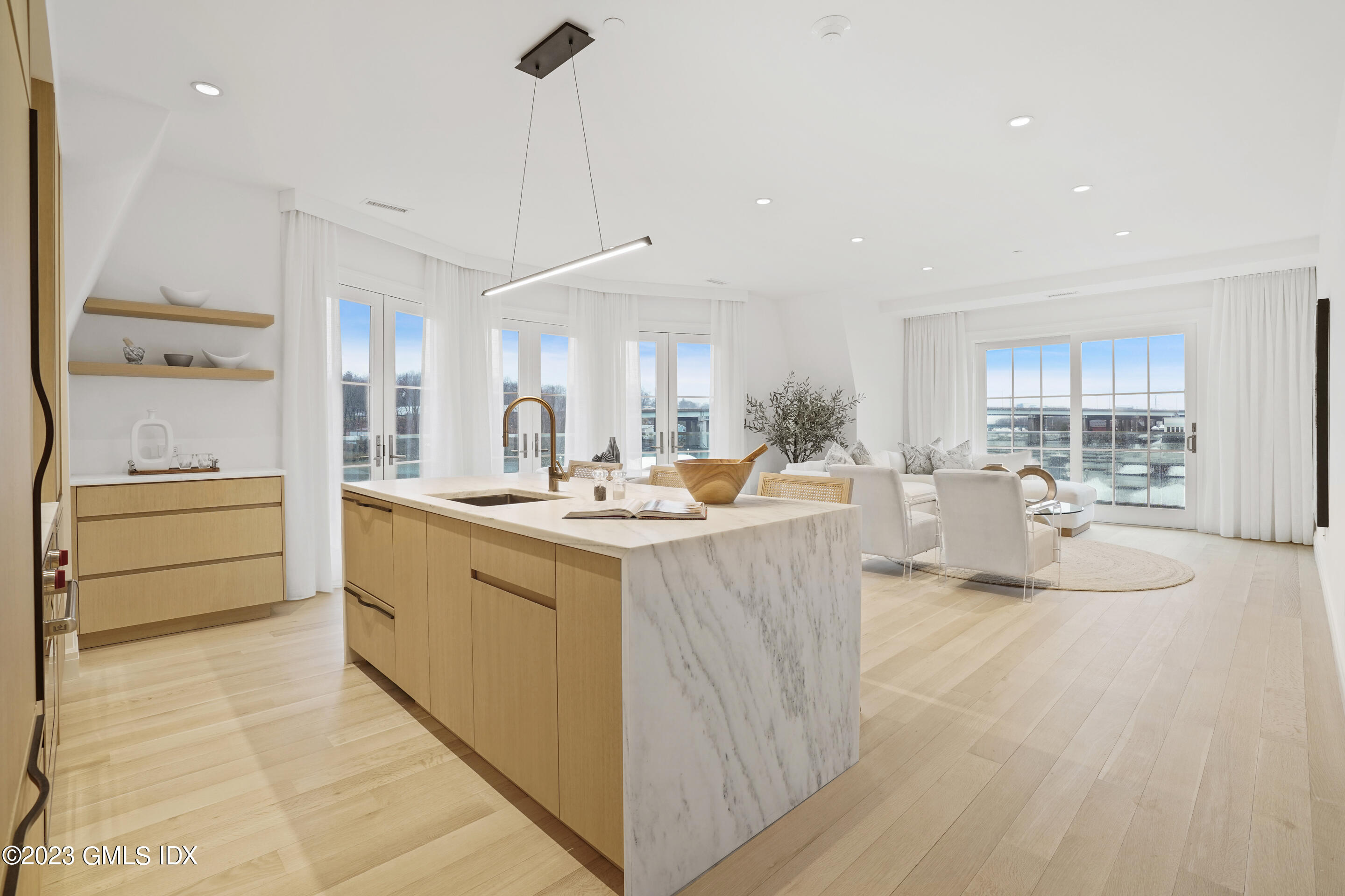 89 River Road, Unit 204 Cos Cob, CT 06807 - Photo 1 of 25 a kitchen with stainless steel appliances granite countertop a sink a stove and a refrigerator