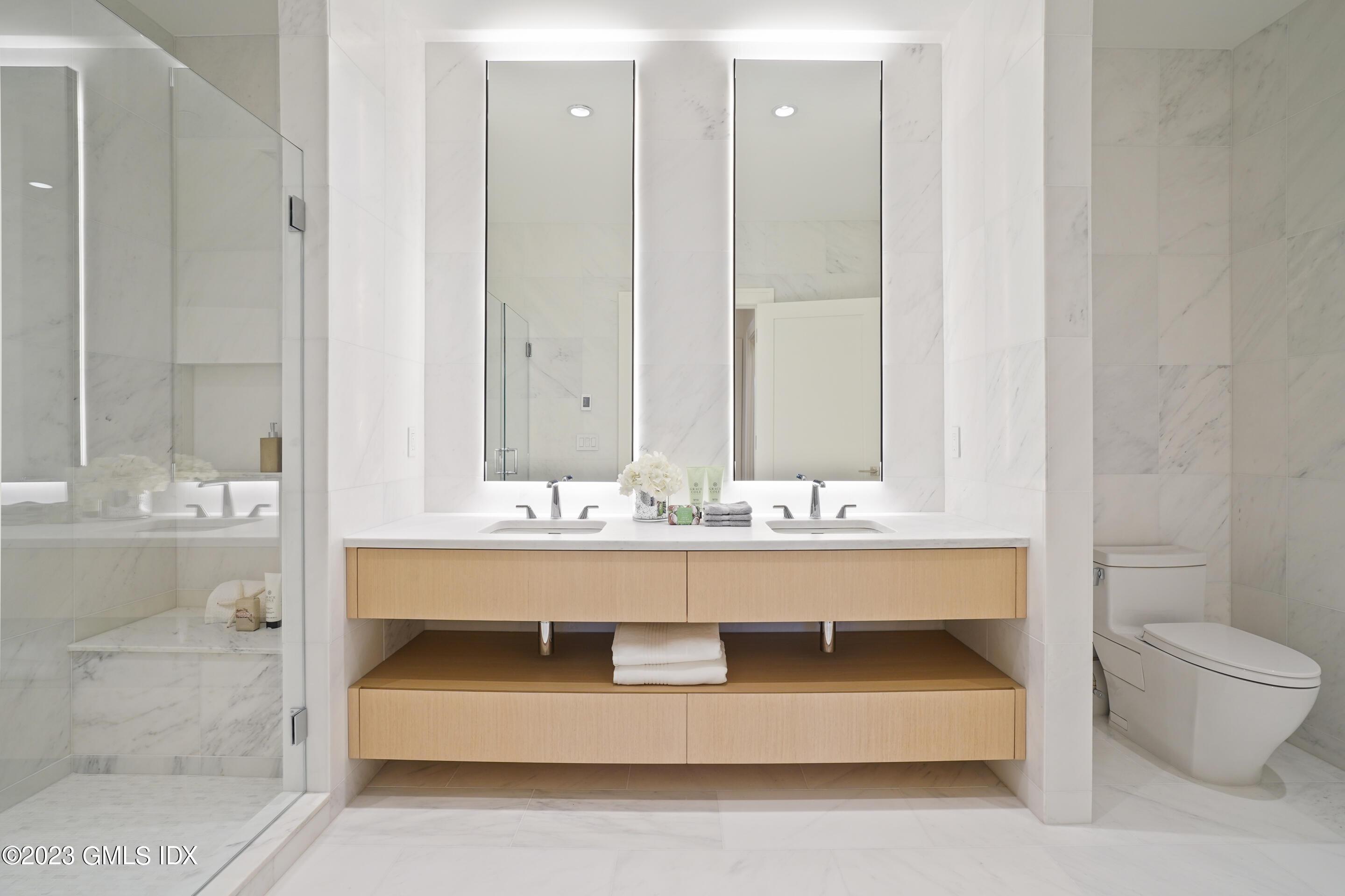 89 River Road, Unit 204 Cos Cob, CT 06807 - Photo 8 of 25 a view of bathroom with bathtub and shower