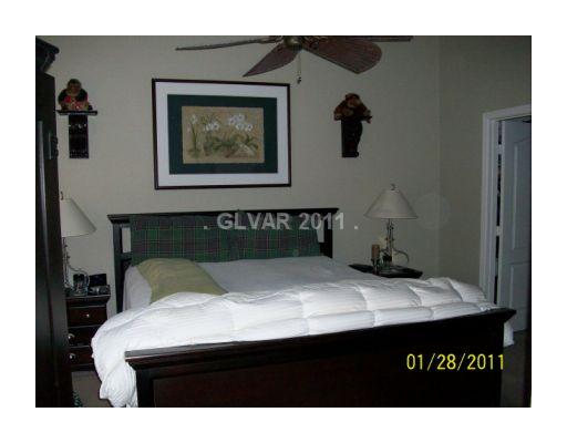 9153 Rusty Rifle Avenue Las Vegas, NV 89143 - Photo 13 of 18 Master Bedroom.