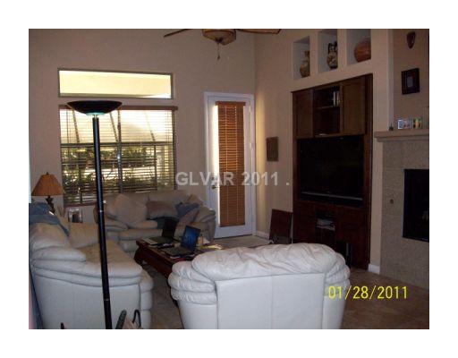 9153 Rusty Rifle Avenue Las Vegas, NV 89143 - Photo 3 of 18 Living Room.