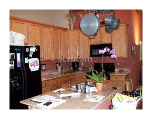9153 Rusty Rifle Avenue Las Vegas, NV 89143 - Photo 5 of 18 Kitchen.