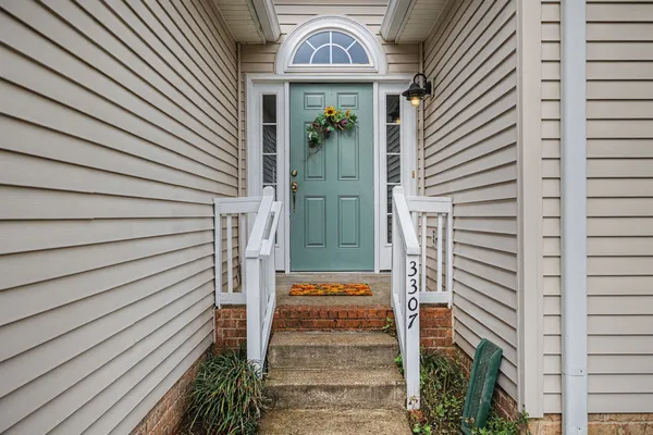 a front view of a house with a door
