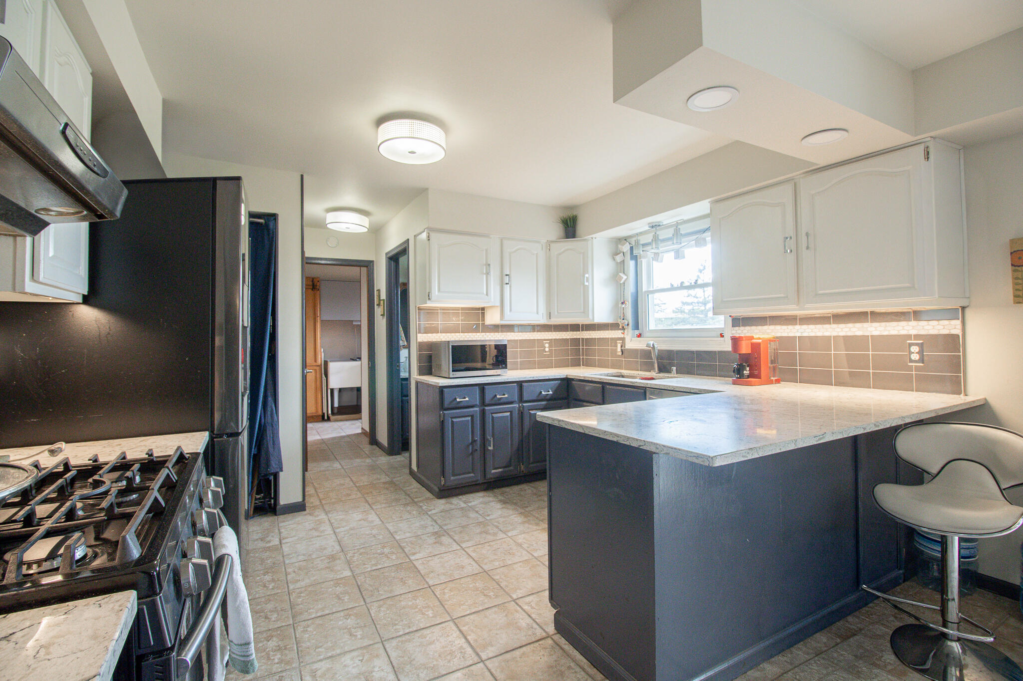 W204N4833 North Lannon Road Menomonee Falls, WI 53051 - Photo 15 of 45 Kitchen to Laundry Room
