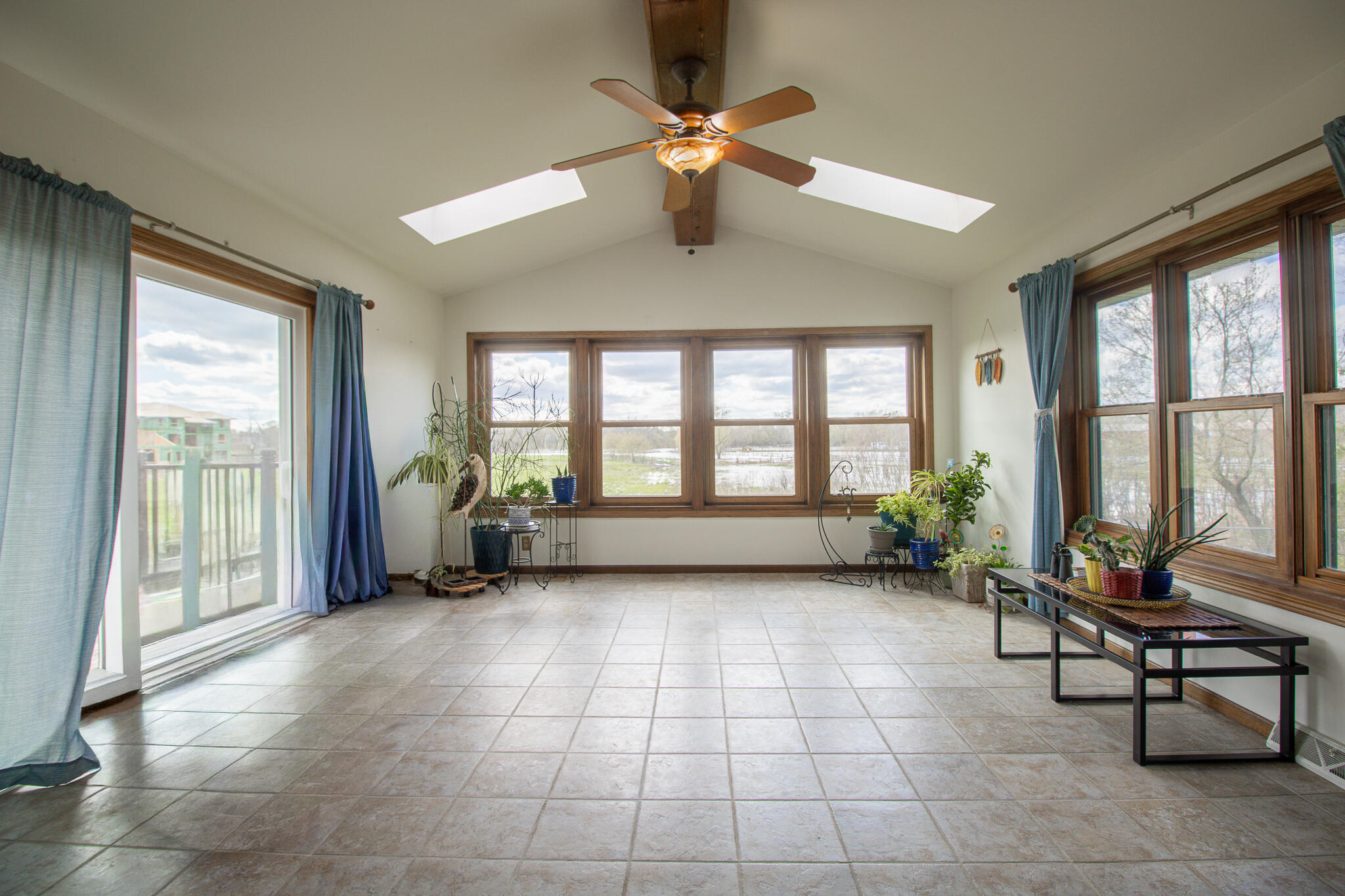 W204N4833 North Lannon Road Menomonee Falls, WI 53051 - Photo 20 of 45 Sunroom Facing Backyard