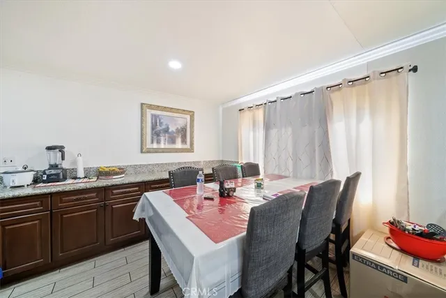 a room with furniture and gym equipment