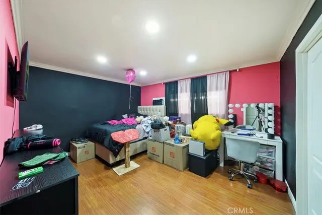 a bedroom with a bed and a closet