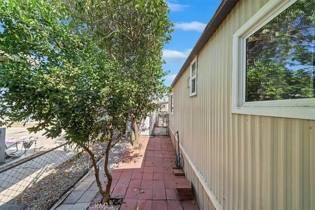 a view of a pathway of a house with wooden floor