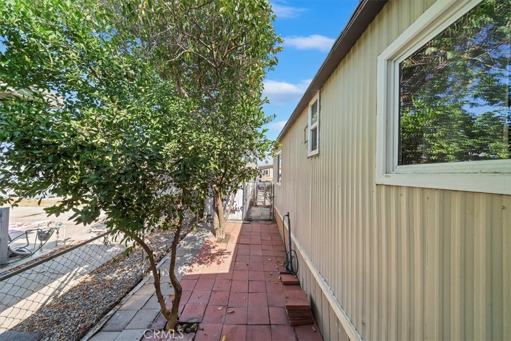 250 North Linden Avenue, Unit 327 Rialto, CA 92376 - Photo 26 of 27 a porch with seating space