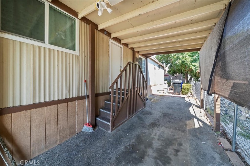 250 North Linden Avenue, Unit 327 Rialto, CA 92376 - Photo 8 of 27 a view of a porch with wooden floor and outdoor space
