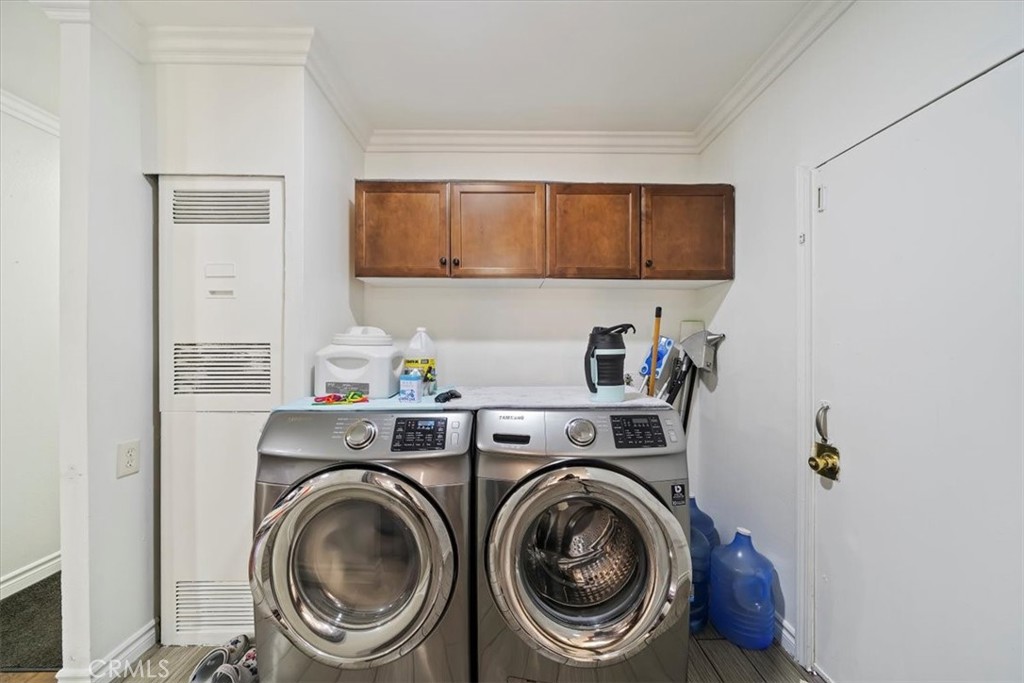 250 North Linden Avenue, Unit 327 Rialto, CA 92376 - Photo 10 of 27 a view of kitchen sink washer and dryer