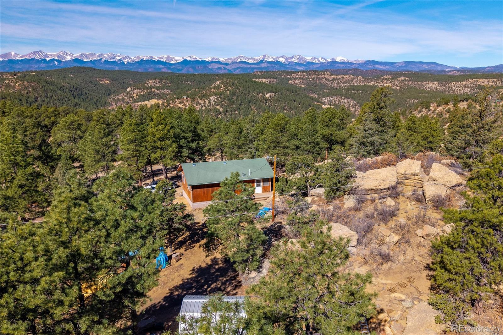 13240 Big Pine Ridge Road Weston, CO 81091 - Photo 41 of 49 a view of a city with mountains in the background