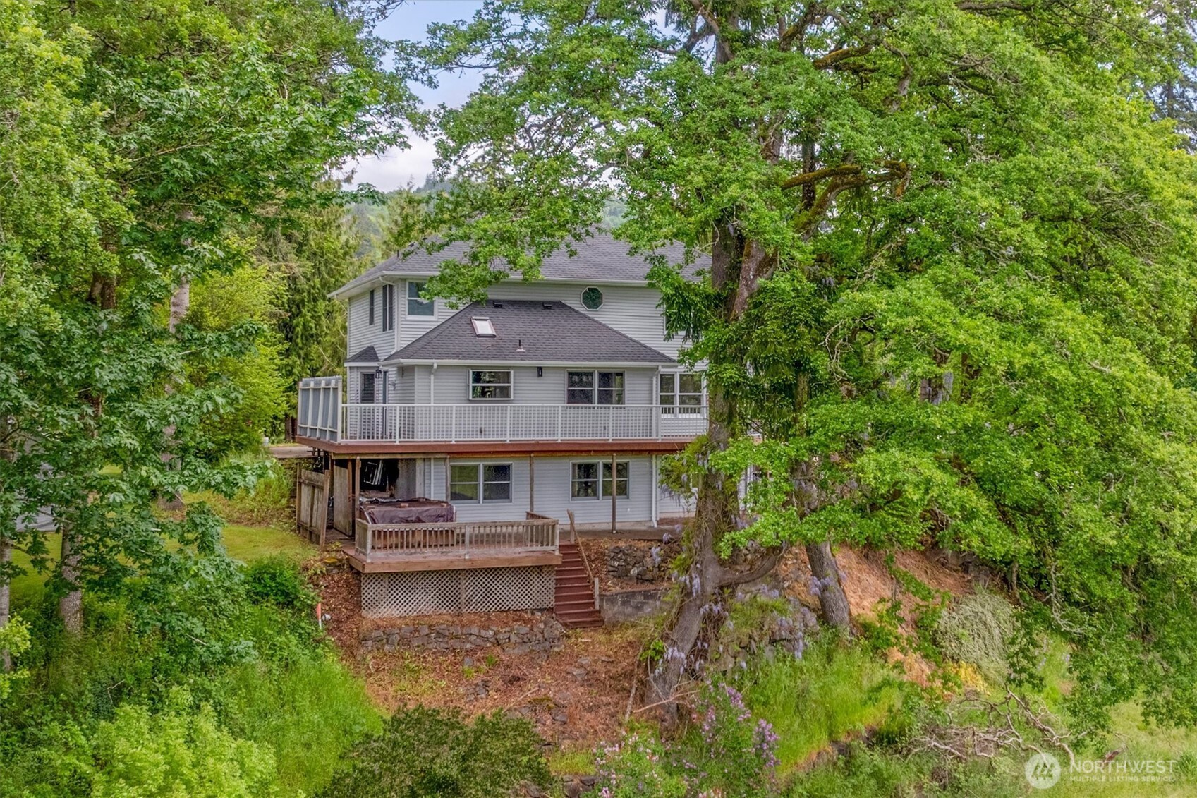 187 Acorn Lane Longview, WA 98632 - Photo 28 of 40 an aerial view of a house with a big yard