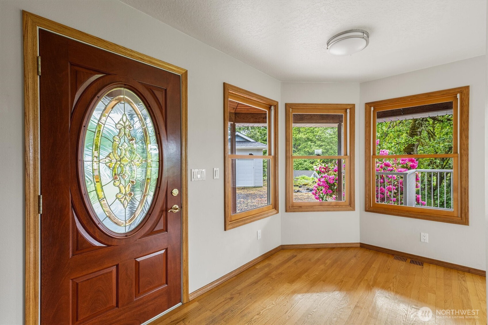 187 Acorn Lane Longview, WA 98632 - Photo 3 of 40 an empty room with windows and outdoor view