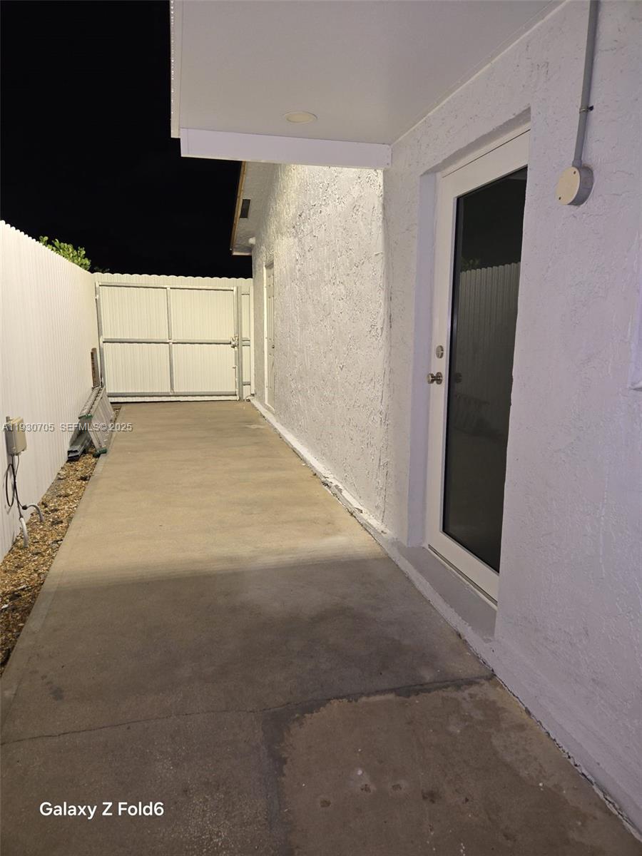 a view of empty room with windows