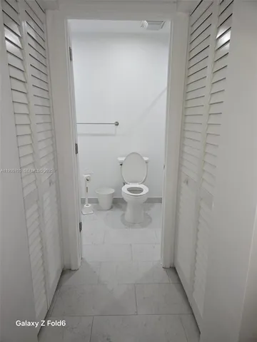 a bathroom with a toilet