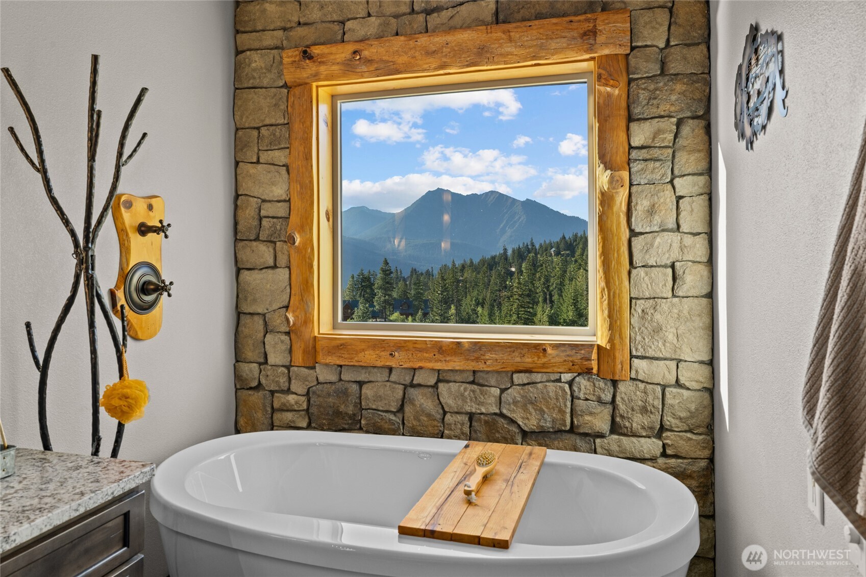 1481 Morgan Creek Road Ronald, WA 98940 - Photo 19 of 40 a bath tub sitting next to a blue sink and a window