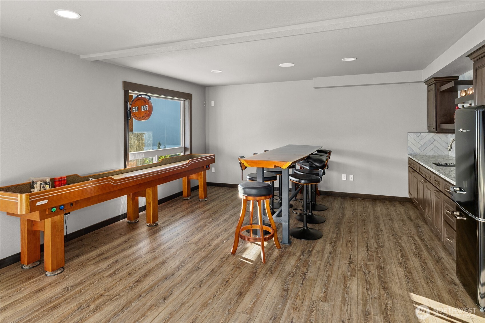 1481 Morgan Creek Road Ronald, WA 98940 - Photo 23 of 40 a room with wooden floor and gym equipment