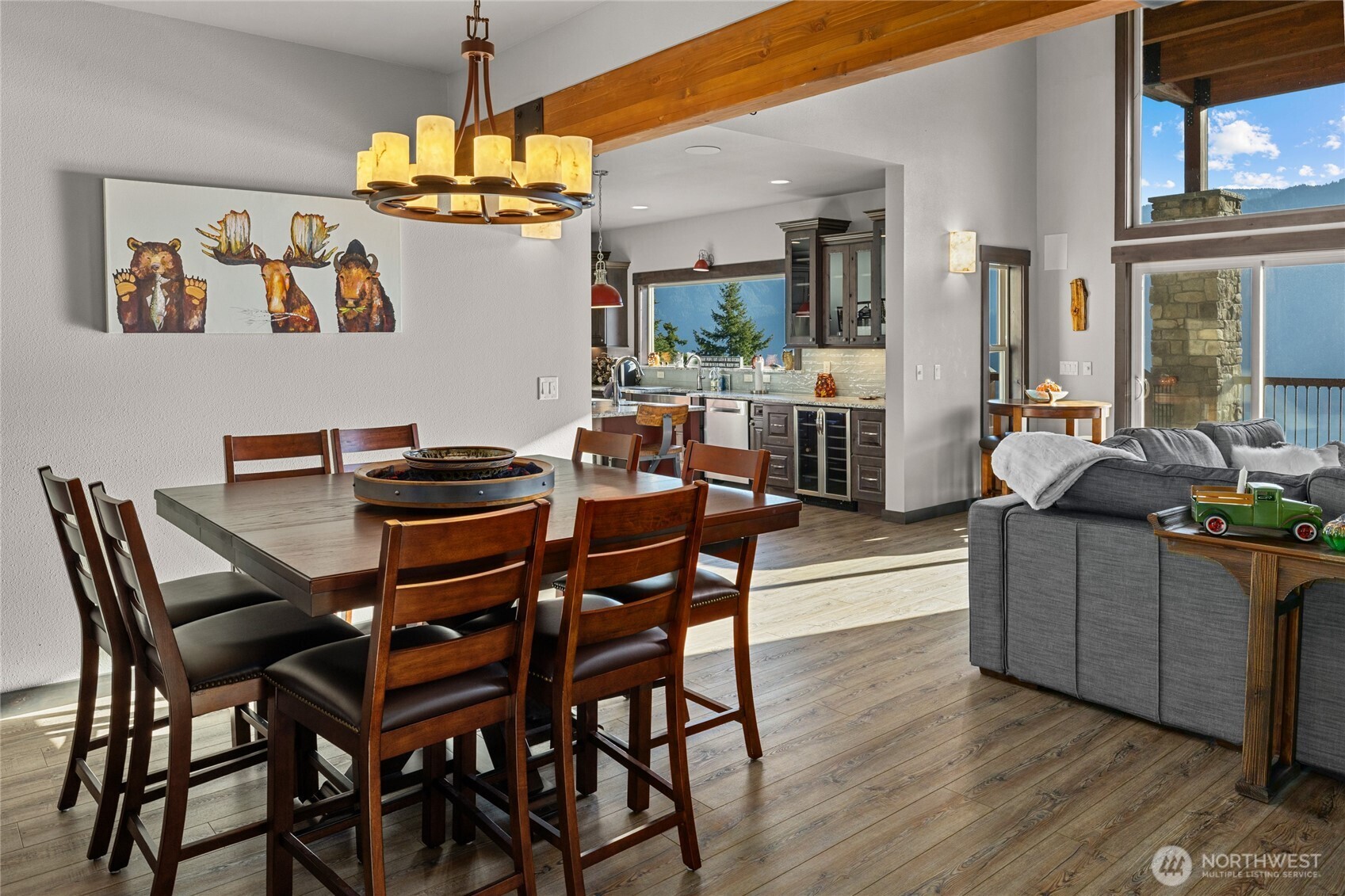1481 Morgan Creek Road Ronald, WA 98940 - Photo 3 of 40 a dining room with furniture a chandelier and wooden floor