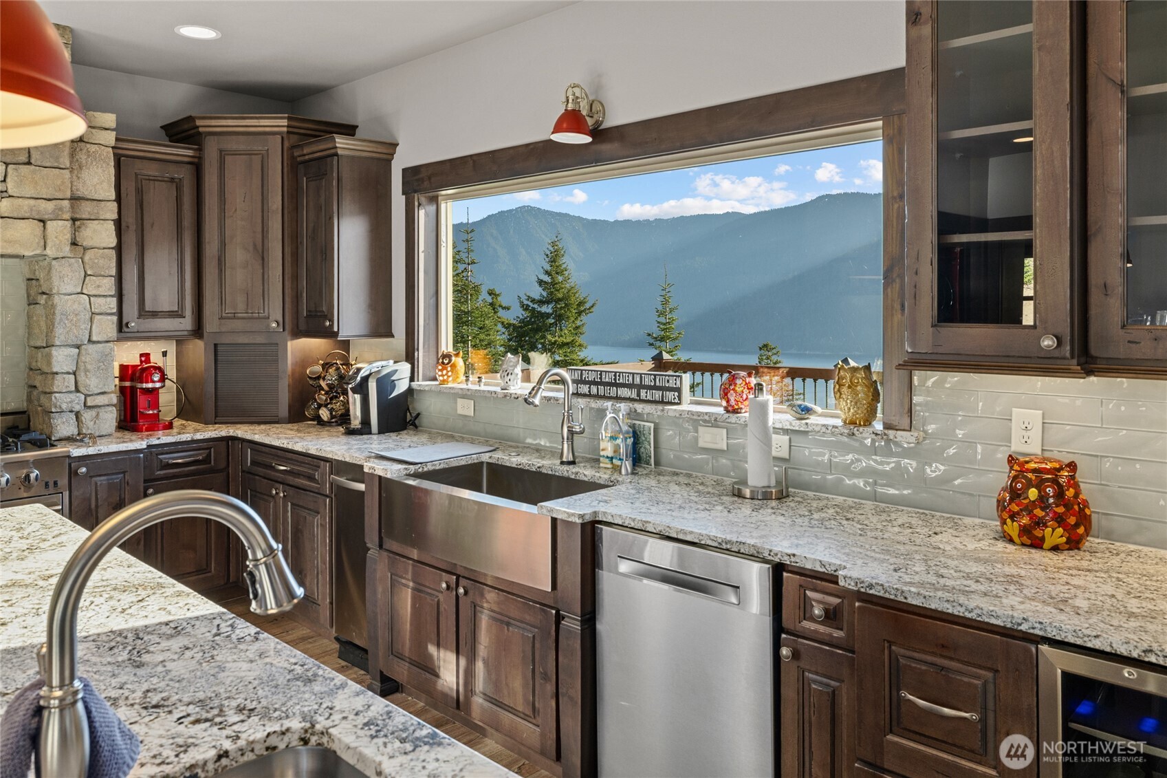1481 Morgan Creek Road Ronald, WA 98940 - Photo 6 of 40 a kitchen with a sink a stove and a wooden floors