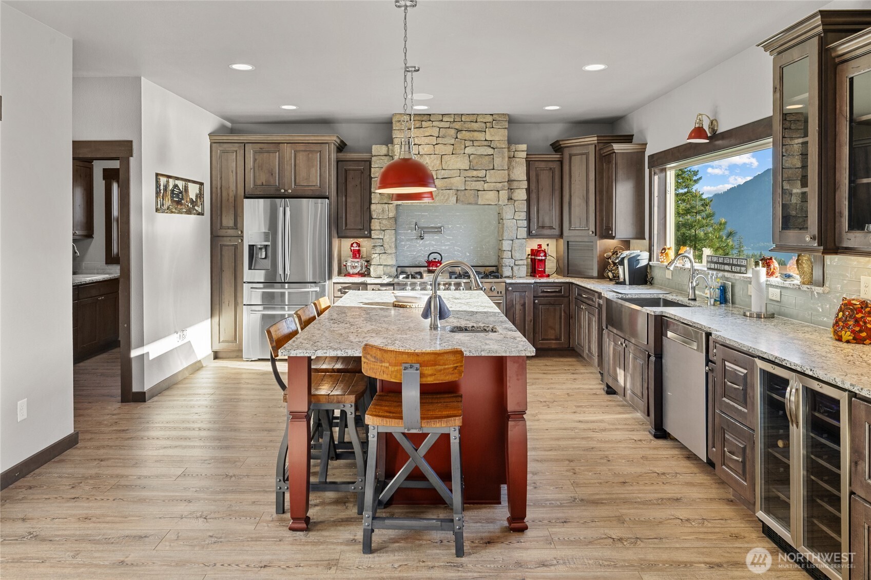 1481 Morgan Creek Road Ronald, WA 98940 - Photo 10 of 40 a large kitchen with a table and chairs