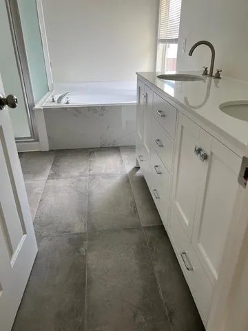 a view of cabinets and a sink