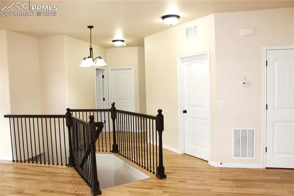 a kitchen with stainless steel appliances granite countertop a stove and a microwave