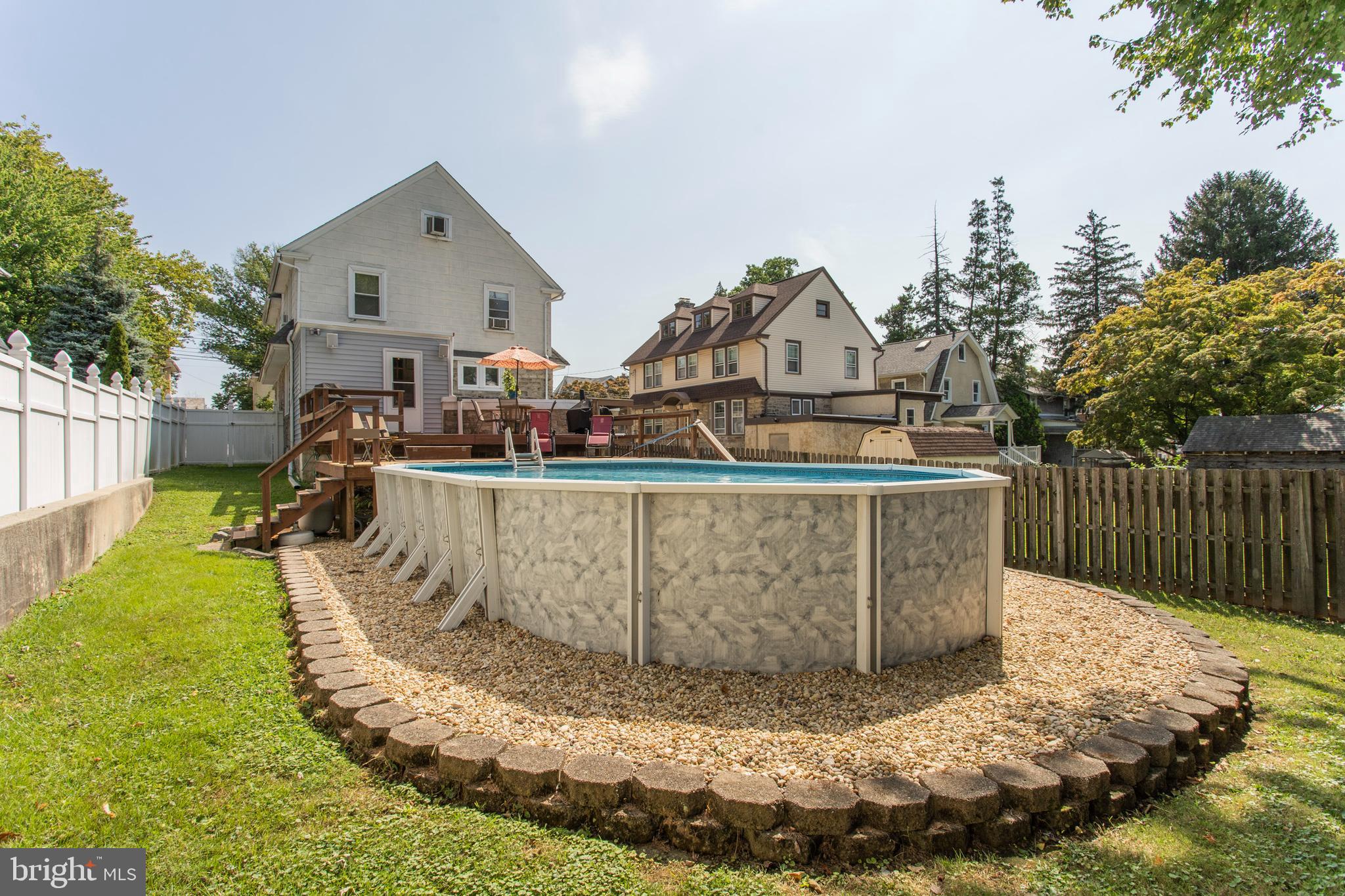 7212 Wayne Avenue Upper Darby, PA 19082 - Photo 19 of 20 Above-ground pool with deck