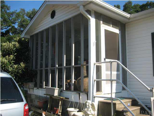 806 Decatur Avenue Pensacola, FL 32507 - Photo 2 of 12 Entrance to home, totally screened in 9.10+- X 13.3 +- porch with ceiling fan..