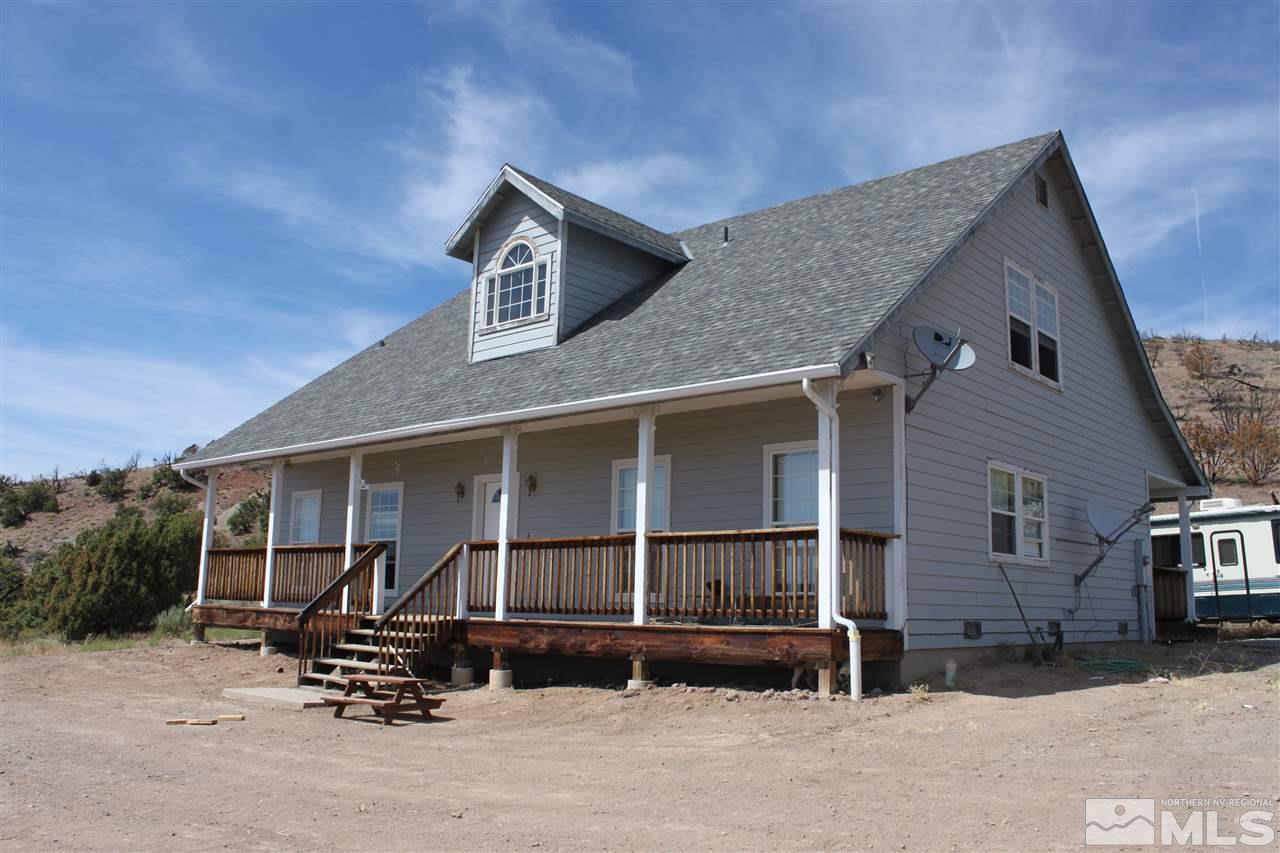 2000 Piute Creek Road Reno, NV 89510 - Photo 1 of 17 a view of a house with a patio