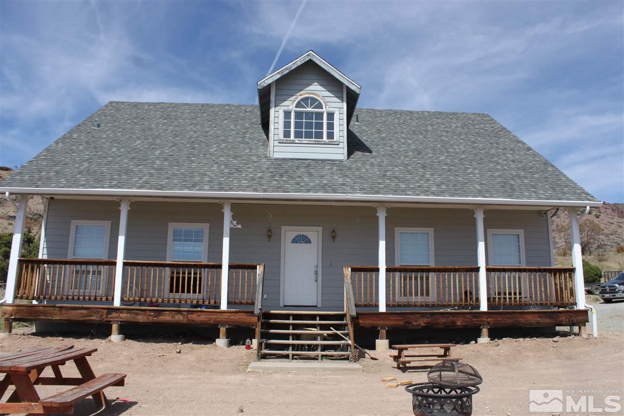 2000 Piute Creek Road Reno, NV 89510 - Photo 16 of 17 front view of a house with a yard