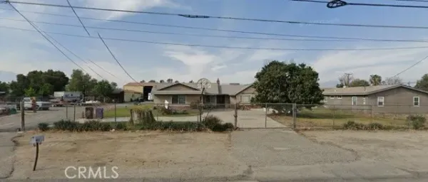 a view of a chairs and table in a patio