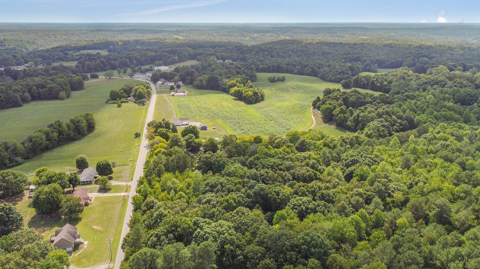 2111 Moorefield Road Cunningham, TN 37052 - Photo 9 of 13 an aerial view of residential houses with outdoor space