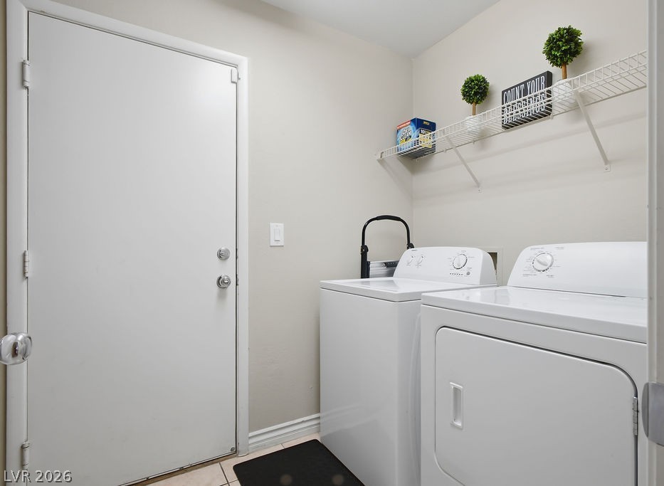 3409 Edinboro Ridge Avenue North Las Vegas, NV 89081 - Photo 13 of 51 Laundry room located downstairs next to half bath and den w/ access to garage. Washer & dryer included.