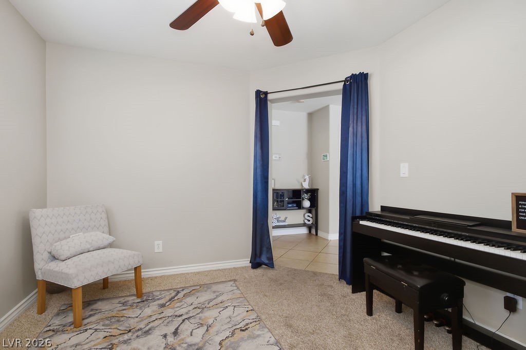 3409 Edinboro Ridge Avenue North Las Vegas, NV 89081 - Photo 15 of 51 Downstairs den w/ carpet and ceiling fan/light combo