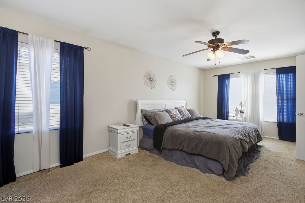 3409 Edinboro Ridge Avenue North Las Vegas, NV 89081 - Photo 26 of 51 The primary bedroom is a very large space, poetential for a relaxation area within the room.