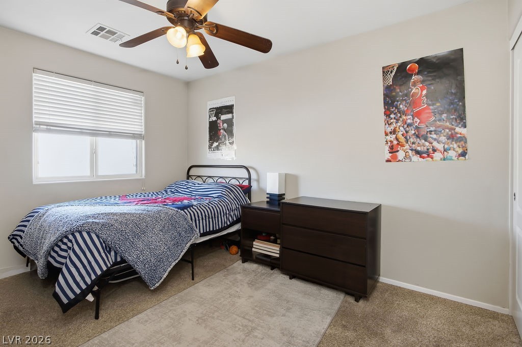 3409 Edinboro Ridge Avenue North Las Vegas, NV 89081 - Photo 34 of 51 Bedroom #4 located next to bedroom #3 w/ ceiling fan & light & 2" faux wood blinds