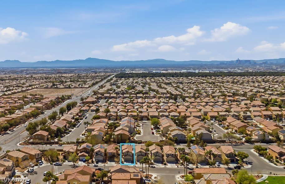 3409 Edinboro Ridge Avenue North Las Vegas, NV 89081 - Photo 39 of 51 Drone view of the neighborhood and surrounding area.
