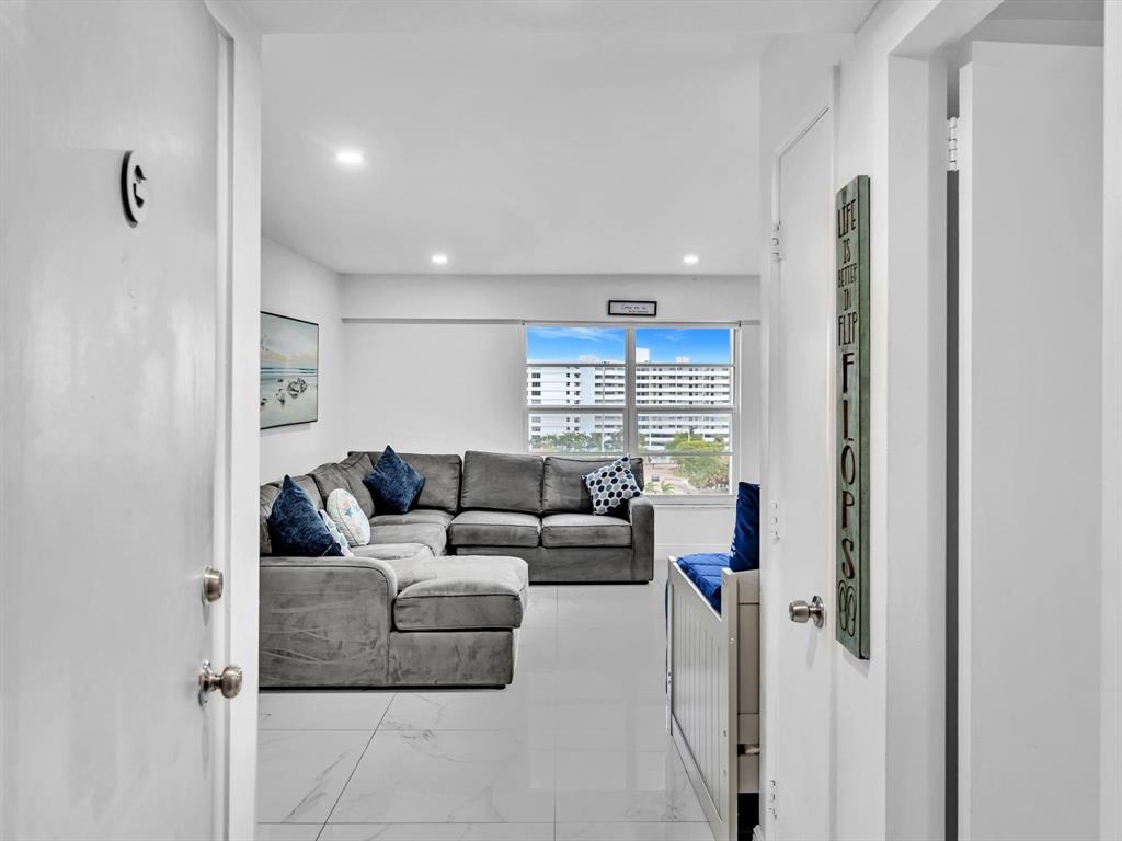 5100 Dupont Boulevard, Unit 8G Fort Lauderdale, FL 33308 - Photo 1 of 65 a living room with furniture and a window
